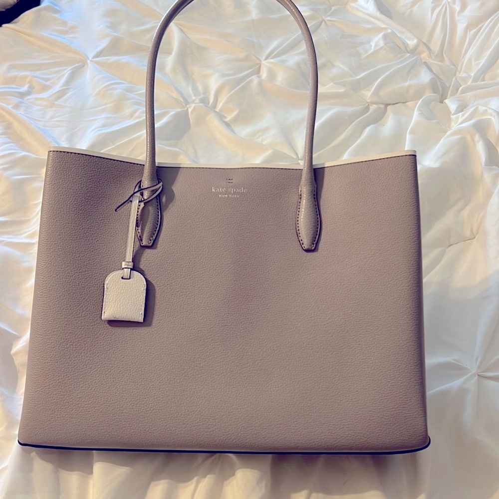 Kate Spade Large Bleeker Tote. Gray with light pink inside.